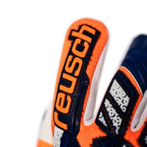 NAME: Attrakt Freegel Gold NC Junior // PALM: Reusch Grip Gold // CUT: Negative Cut // FEATURES: Freegel, AirVentSystem, Preshaped Construction, 3D Thumb Crotch // COLOUR: 2500 shocking orange / energize blue