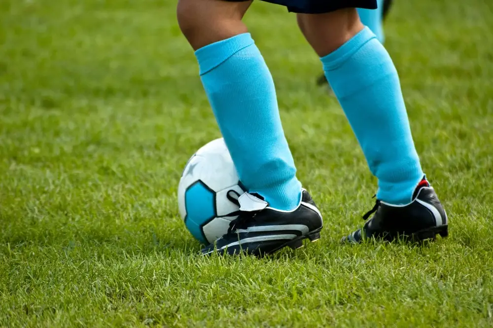 hoe draag je scheenbeschermers